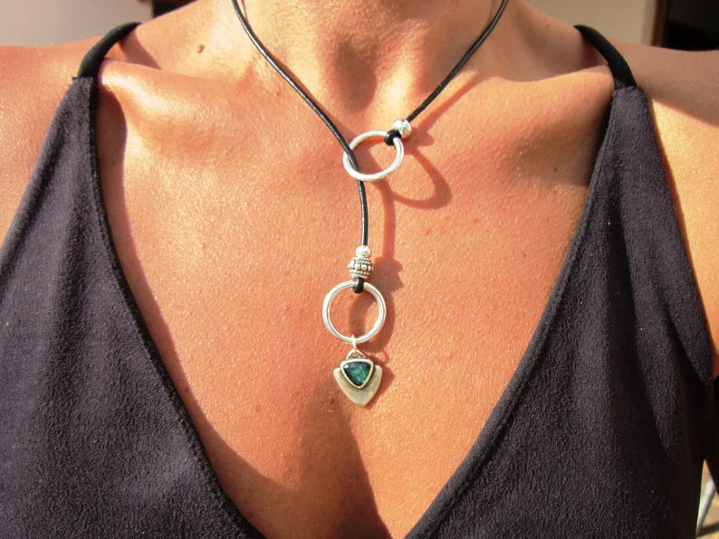 boho-chic leather and silver necklace.