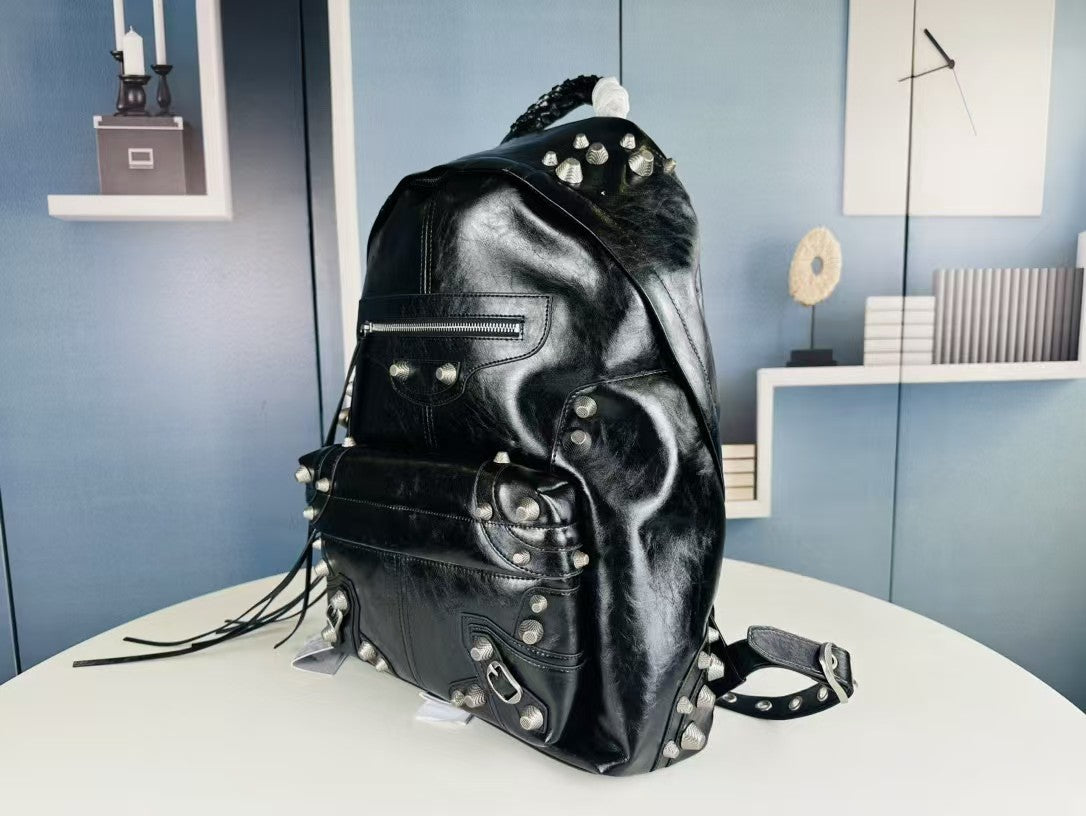 Bold Black Cowhide Leather Backpack