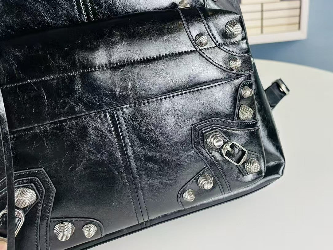 Bold Black Cowhide Leather Backpack